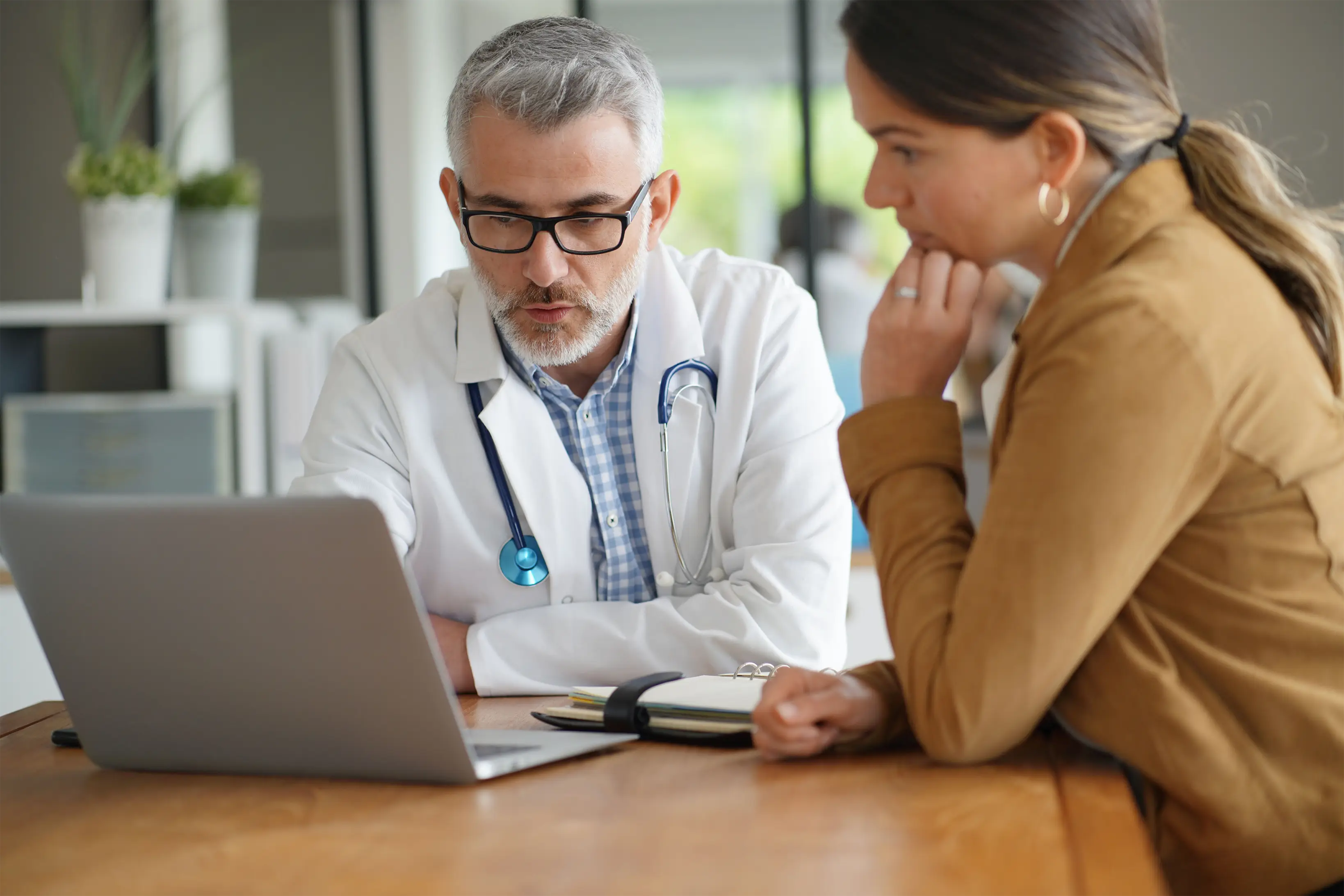 woman talking with a doctor